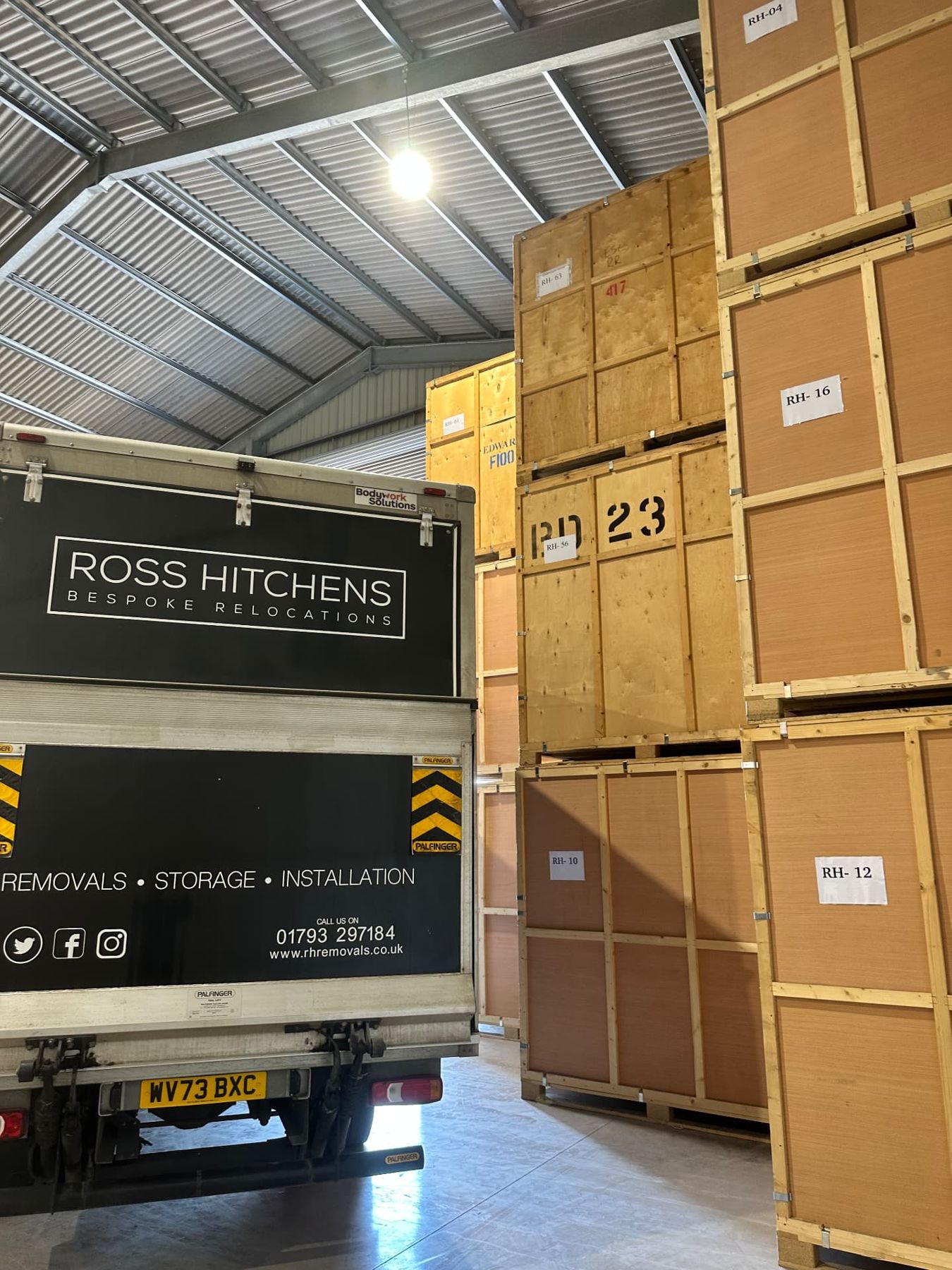Wooden storage containers stacked in the RH warehouse