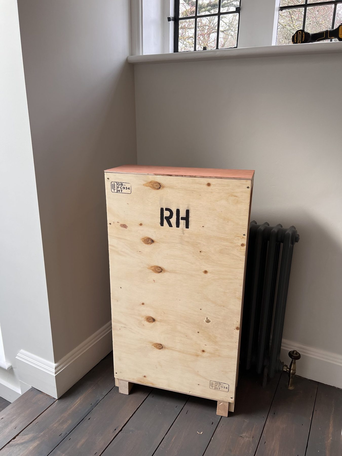 A tall bespoke RH plywood crate